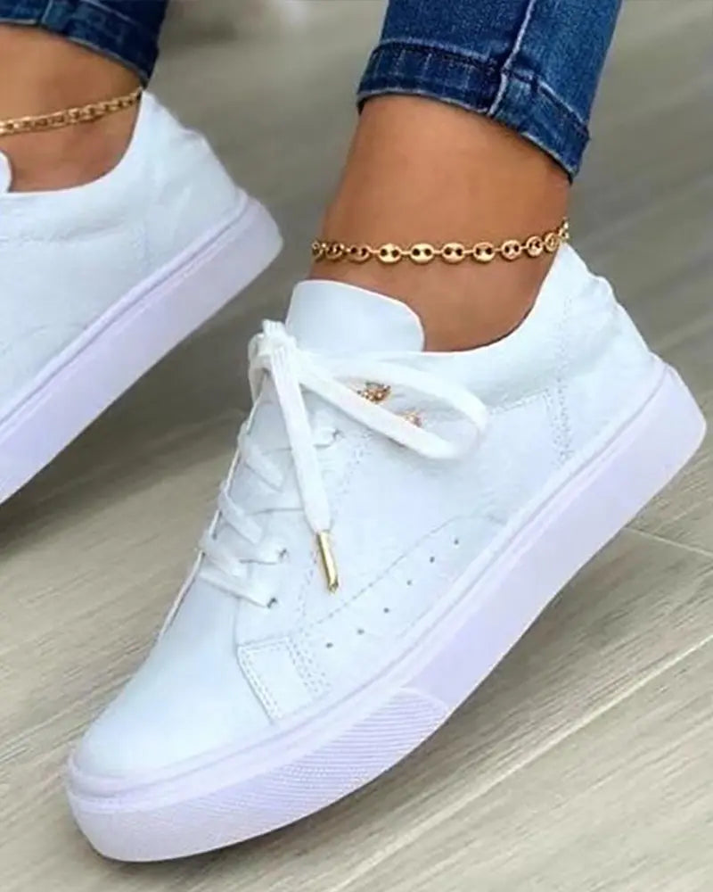 LM | Chic sneakers with golden details