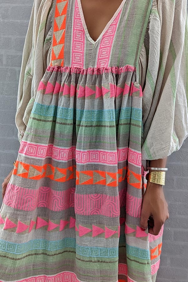 LM | Pink striped midi dress with Greek key and orange necklace