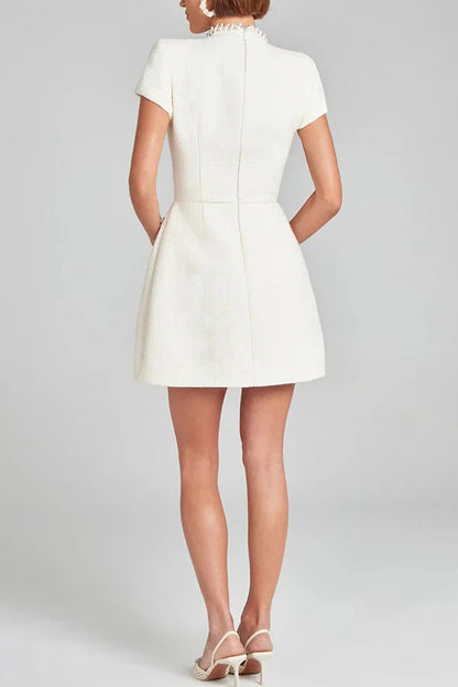 LM | Exquisite and playful tweed fabric beaded short sleeve pocketed mini dress