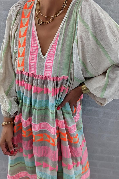 LM | Pink striped midi dress with Greek key and orange necklace